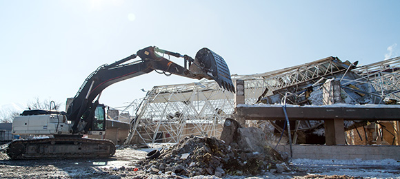 commercial demolition with excavator