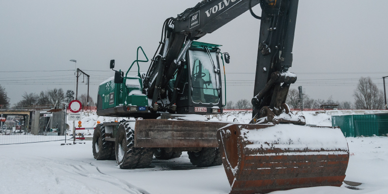 excavator in snow