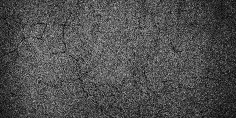 overhead view of cracked pavement